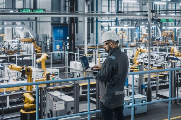 A worker in a car factory.